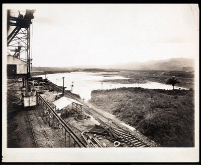 View of railroad tracks and machinery at the construction of the Panama Canal, 1912 or 1913 by Byron Company